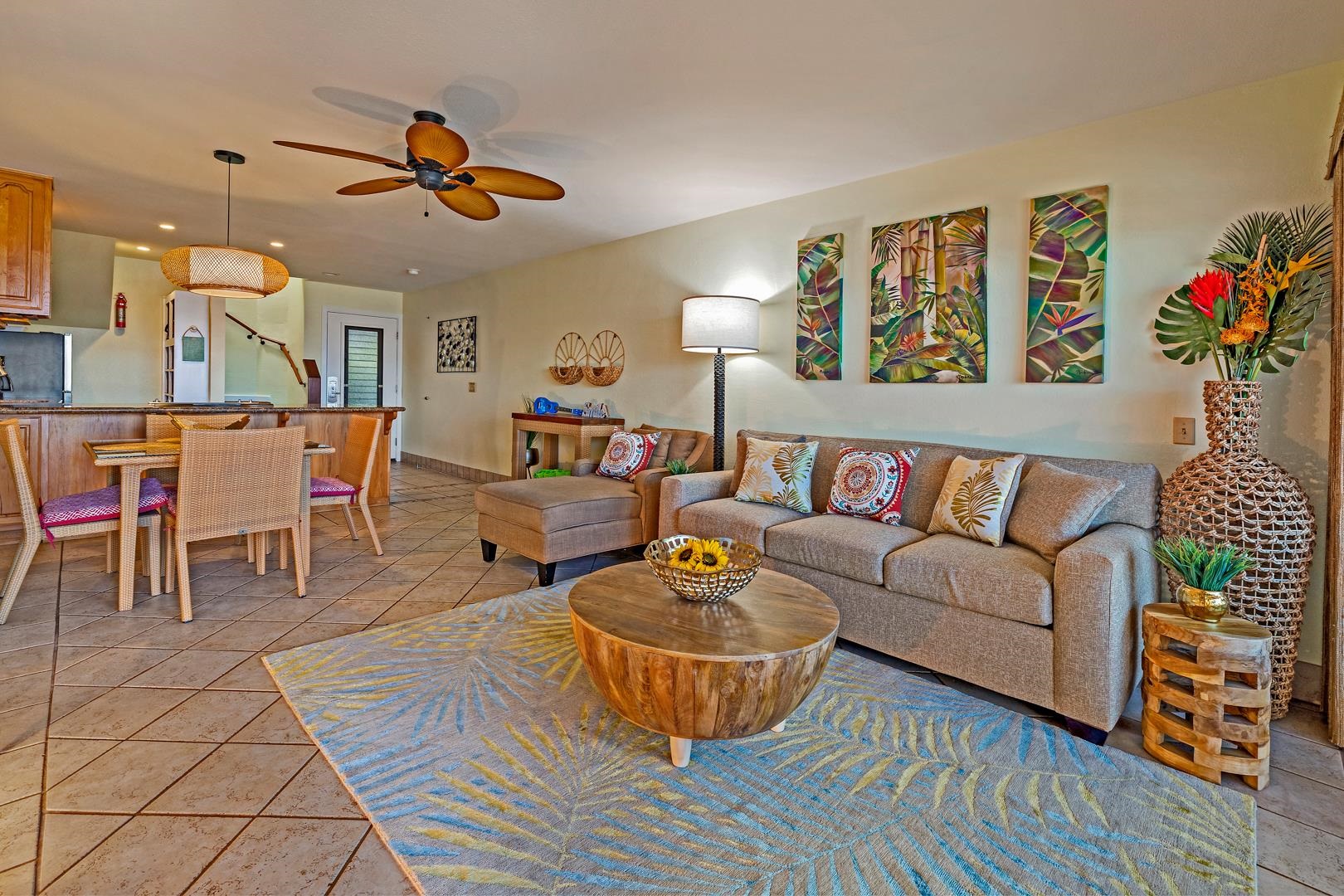 4909 Lower Honoapiilani Road, Unit E5 Lahaina, HI 96761 - Photo 6 of 28 a living room with furniture and a wooden floor