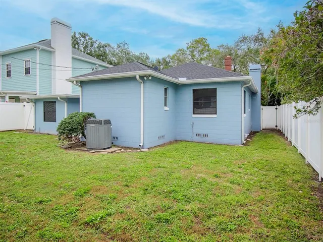 a view of a backyard with plants
