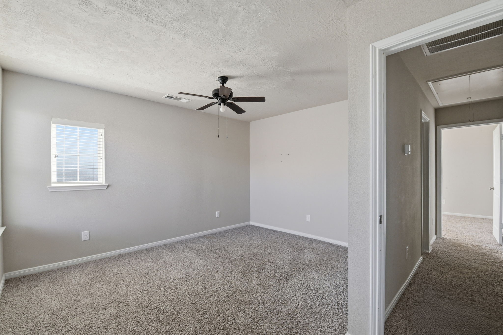 115 Austin Street Angleton, TX 77515 - Photo 23 of 33 a view of room with a ceiling fan