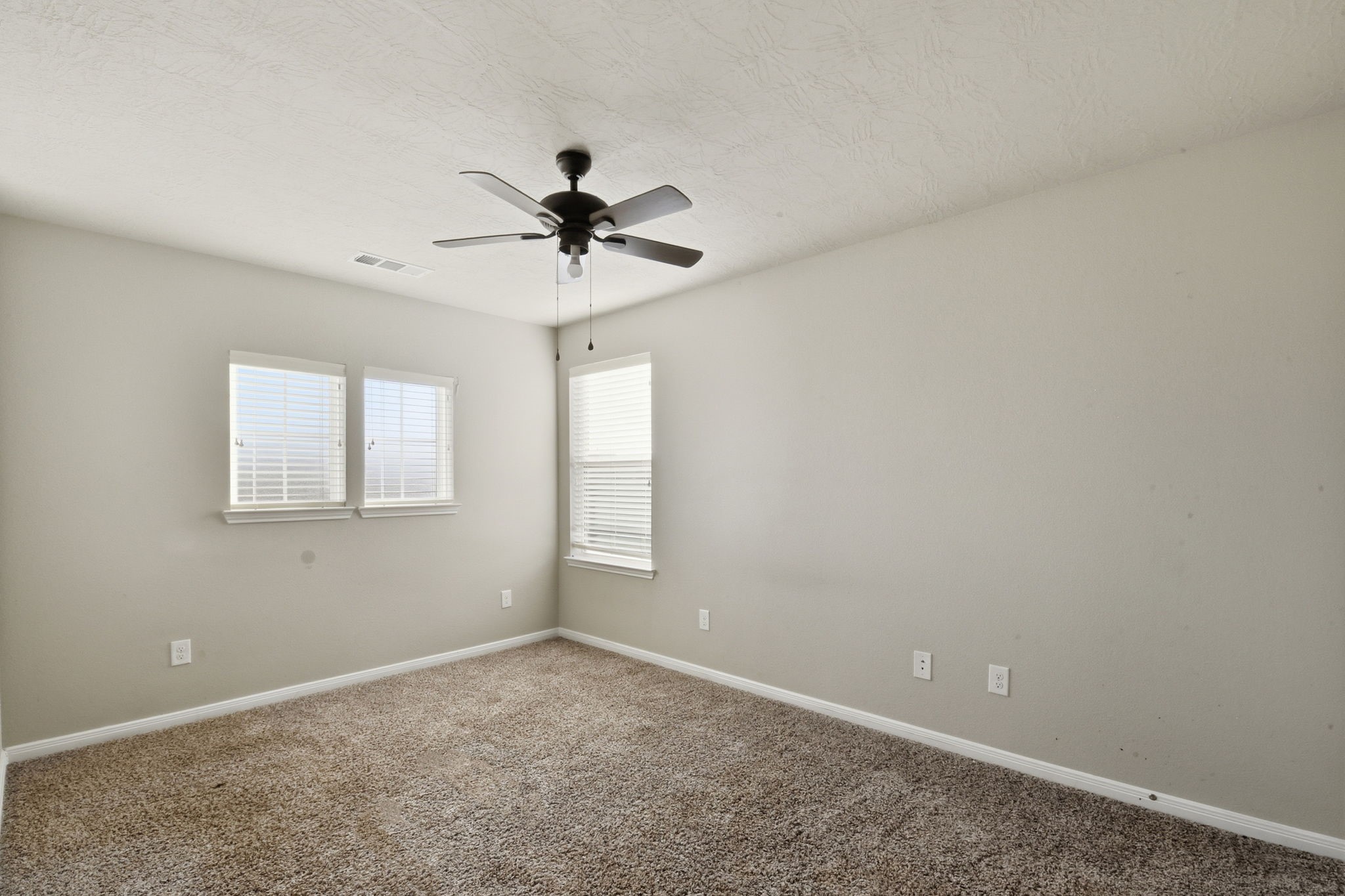 115 Austin Street Angleton, TX 77515 - Photo 27 of 33 a view of an empty room with a window