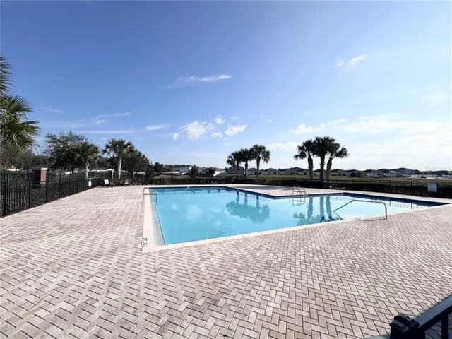 a view of a house with a swimming pool