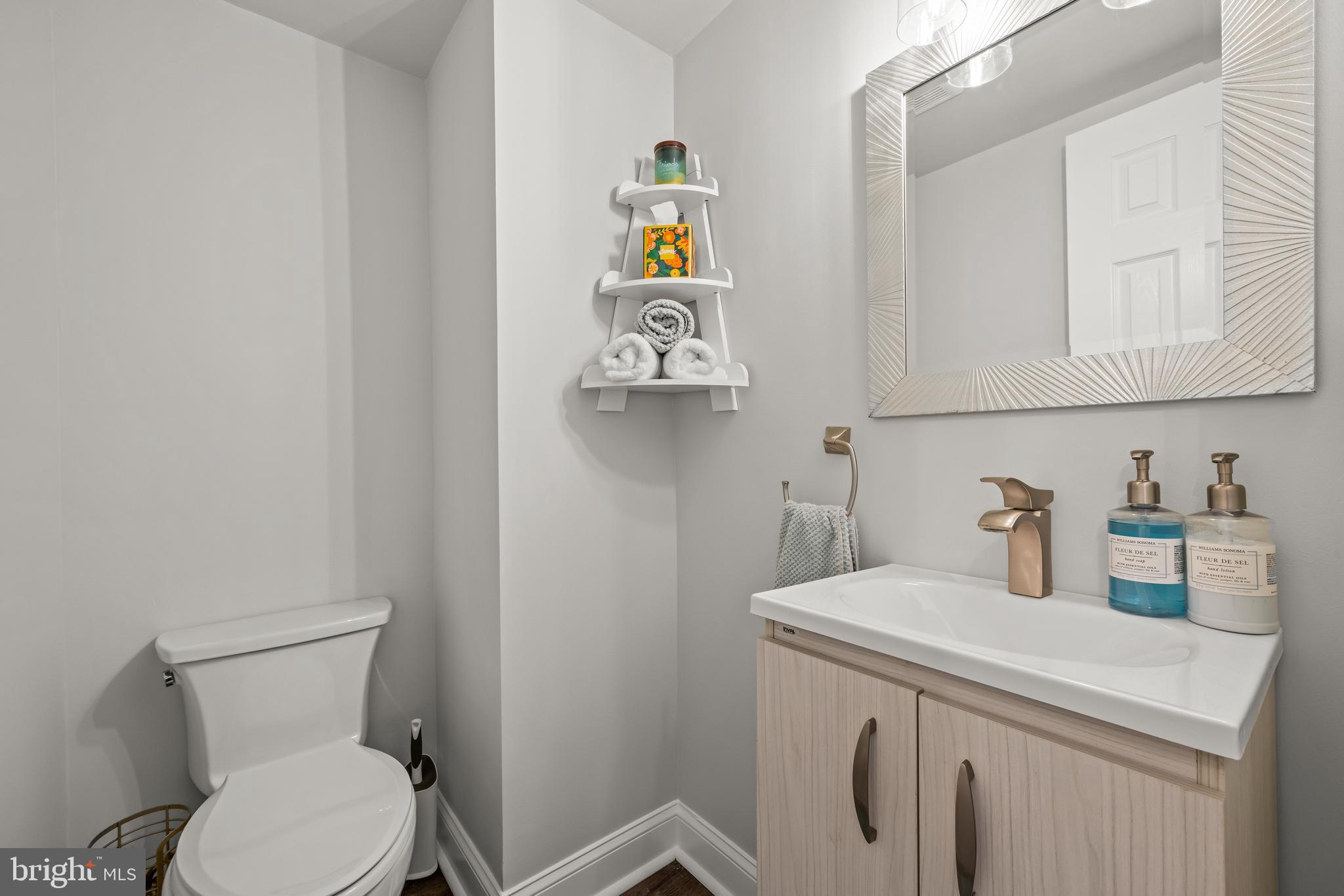 2414 Derby Drive Fallston, MD 21047 - Photo 12 of 41 a bathroom with a toilet sink vanity and granite