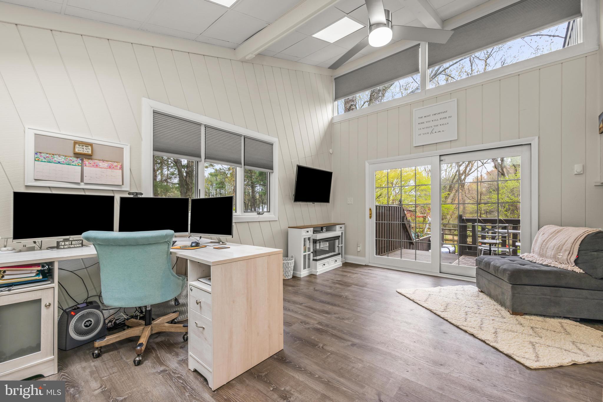 2414 Derby Drive Fallston, MD 21047 - Photo 14 of 41 a living room with furniture a flat screen tv and a table