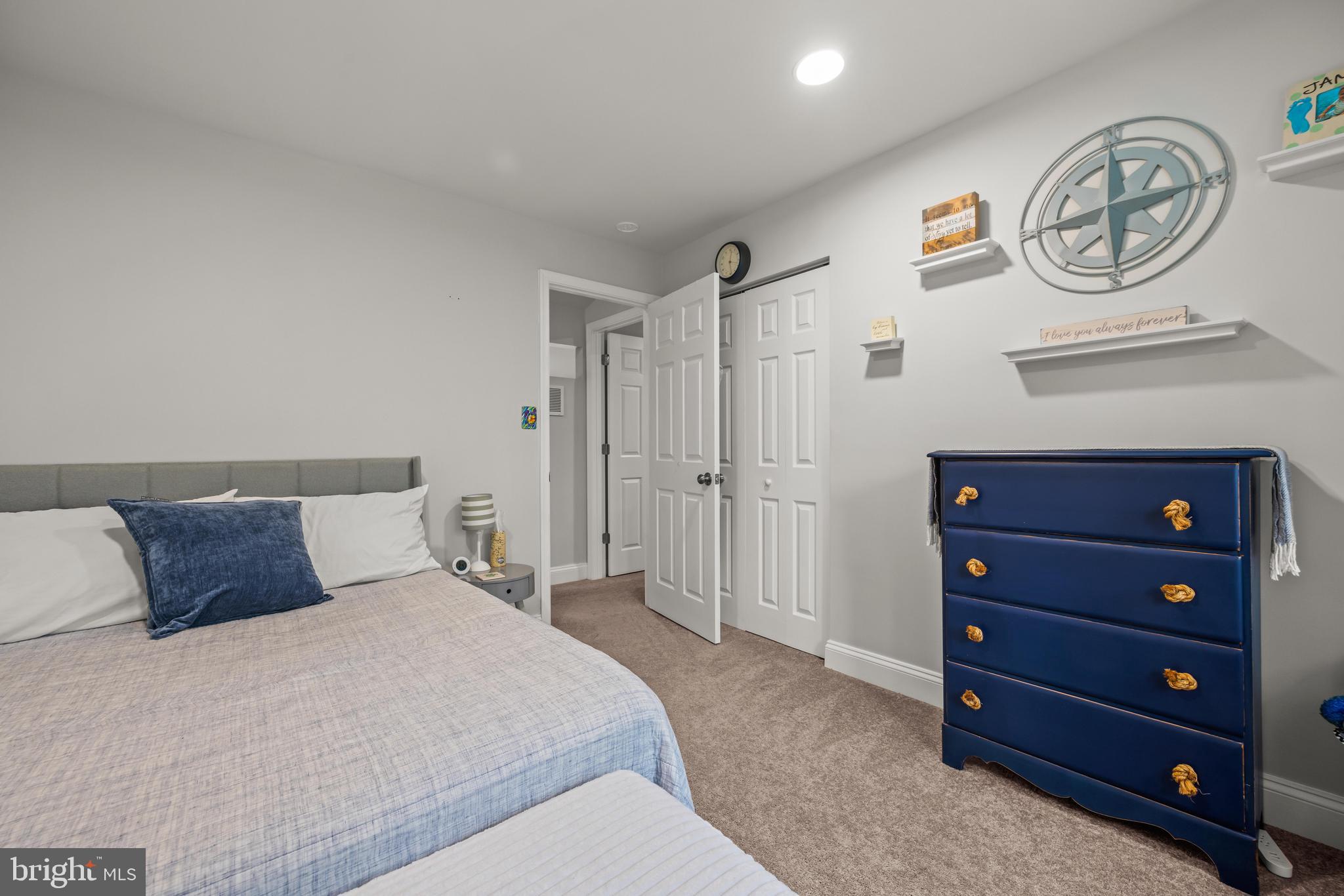 2414 Derby Drive Fallston, MD 21047 - Photo 30 of 41 a bedroom with a bed a mirror and a window