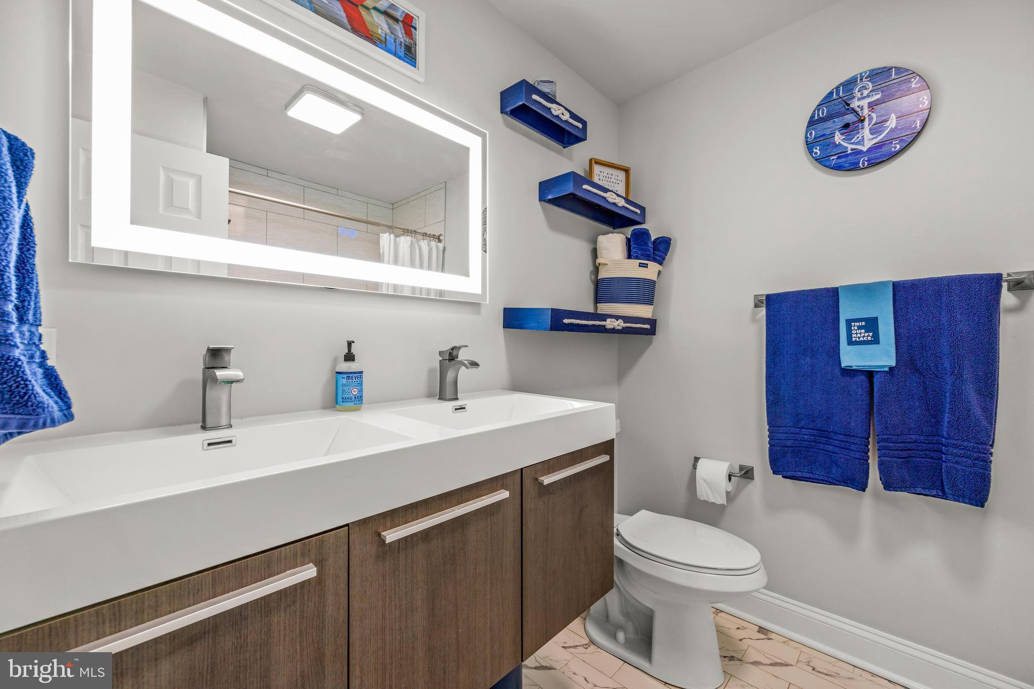 2414 Derby Drive Fallston, MD 21047 - Photo 31 of 41 a bathroom with a sink a toilet and mirror