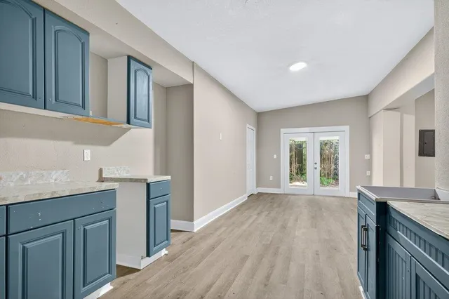 a bathroom with a bathtub and sink