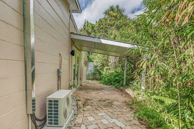 a view of a balcony with wooden floor