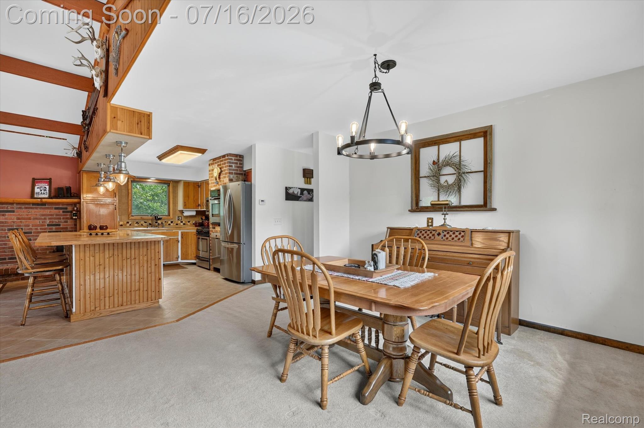 11210 Linden Road Linden, MI 48451 - Photo 13 of 61 Open-concept living space with a kitchen and dining area