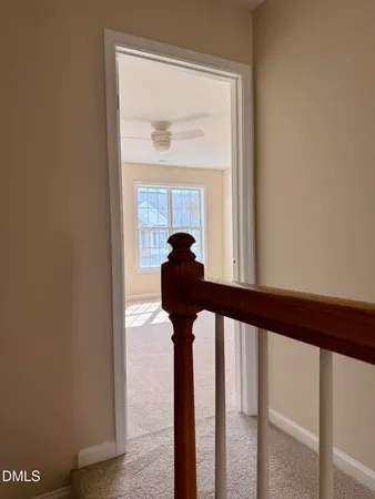 a view of a porch with a potted plant