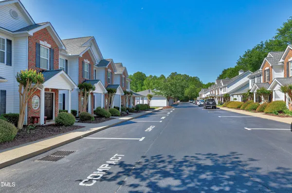 a view of a street with houses