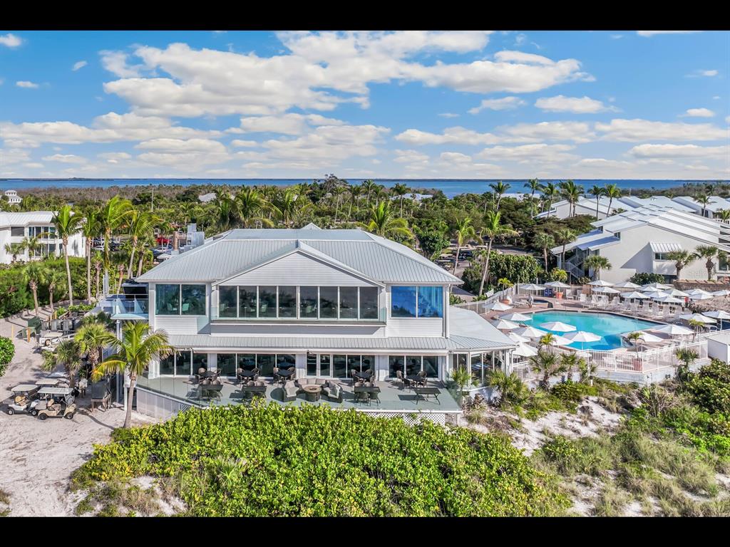5000 Gasparilla Road, Unit BC201 Boca Grande, FL 33921 - Photo 17 of 25 a view of a house with a garden