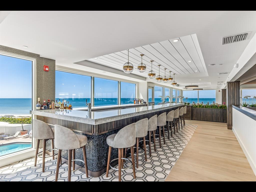 5000 Gasparilla Road, Unit BC201 Boca Grande, FL 33921 - Photo 24 of 25 a view of a kitchen and living room