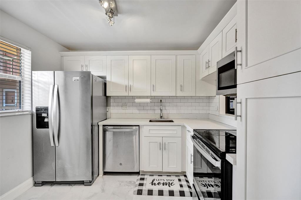 3050 Holiday Springs Boulevard, Unit 210 Margate, FL 33063 - Photo 2 of 24