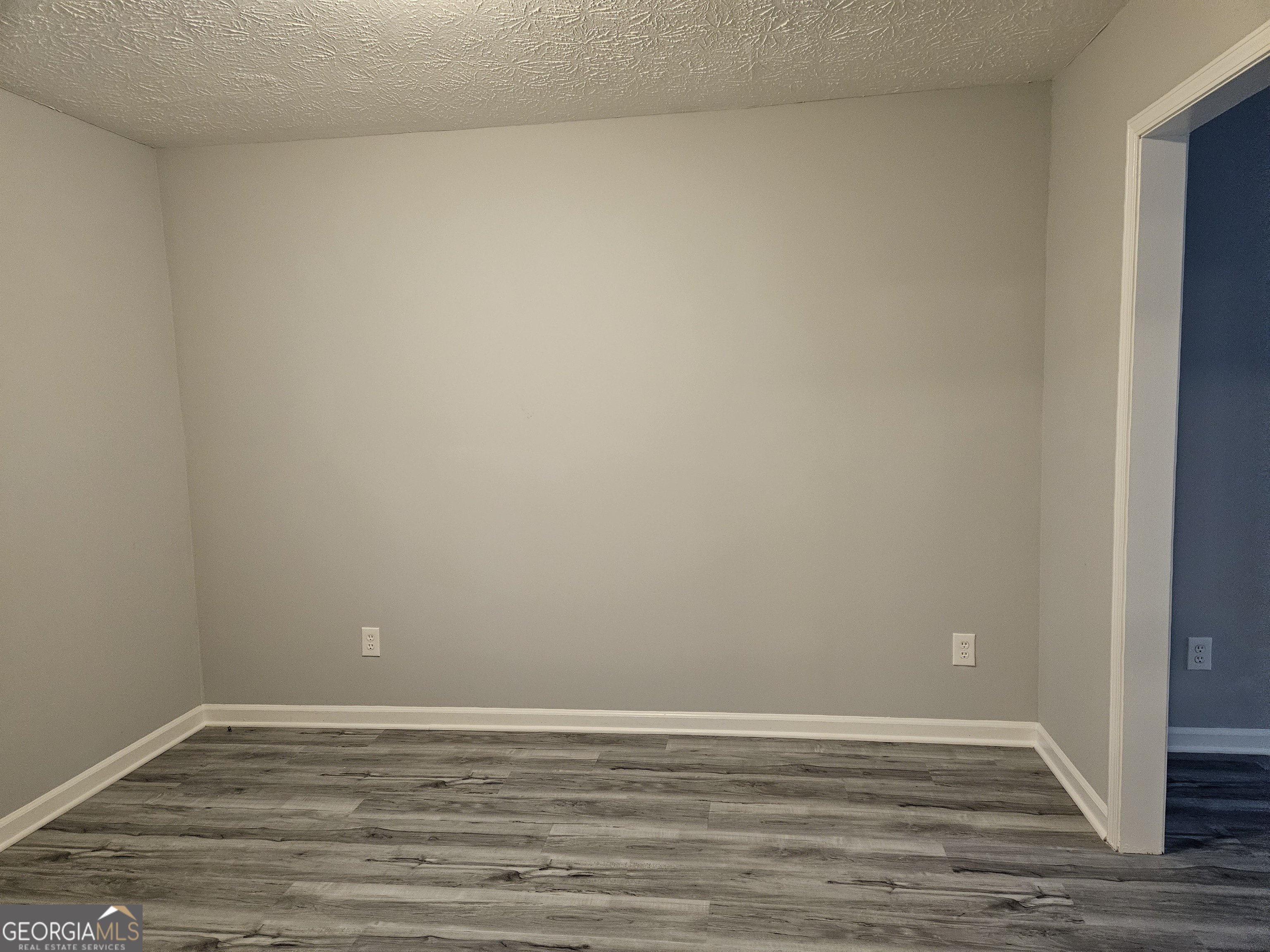 4321 Sebring Walk, Unit 5 Decatur, GA 30034 - Photo 9 of 31 a view of an empty room with wooden floor