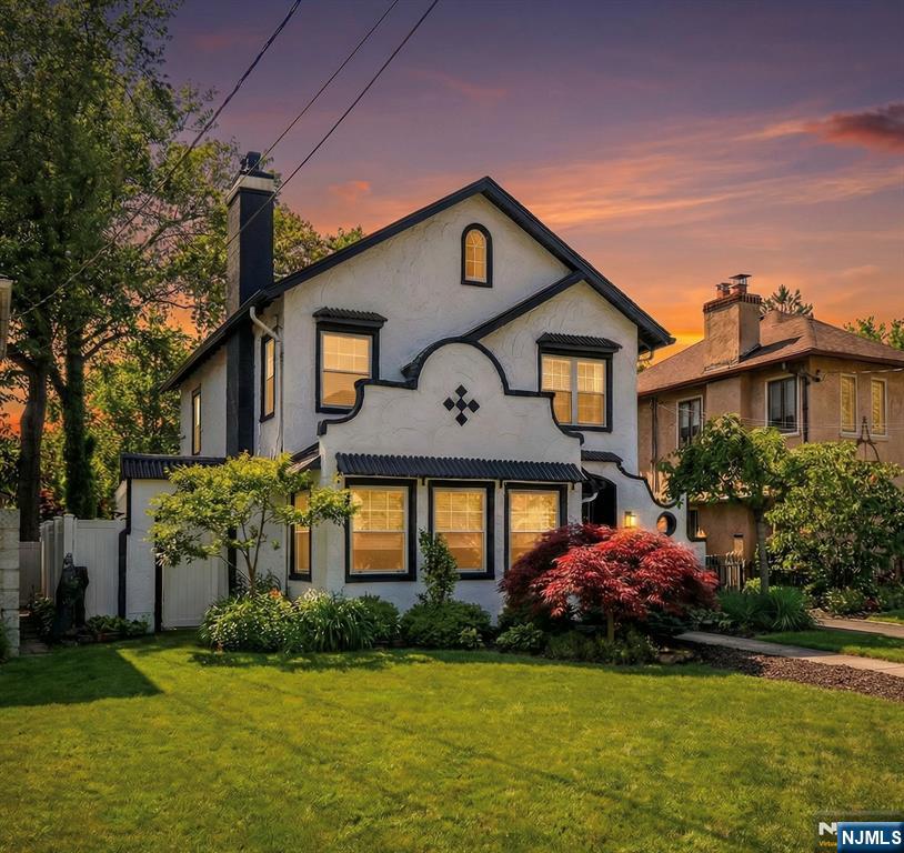 29 Martin Terrace Hackensack, NJ 07601 - Photo 50 of 50 a front view of a house with garden