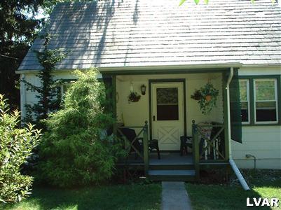 2333 West Best Road Bath, PA 18014 - Photo 1 of 8 a front view of a house with garden