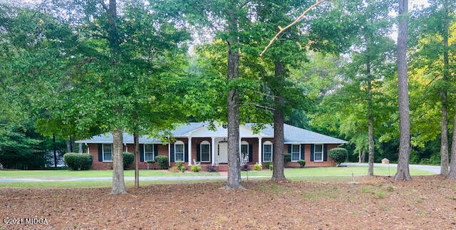72 Bolingview Road Juliette, GA 31046 - Photo 3 of 4 a front view of a house with a yard