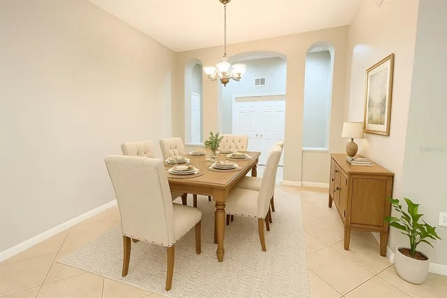 a view of a dining room with furniture