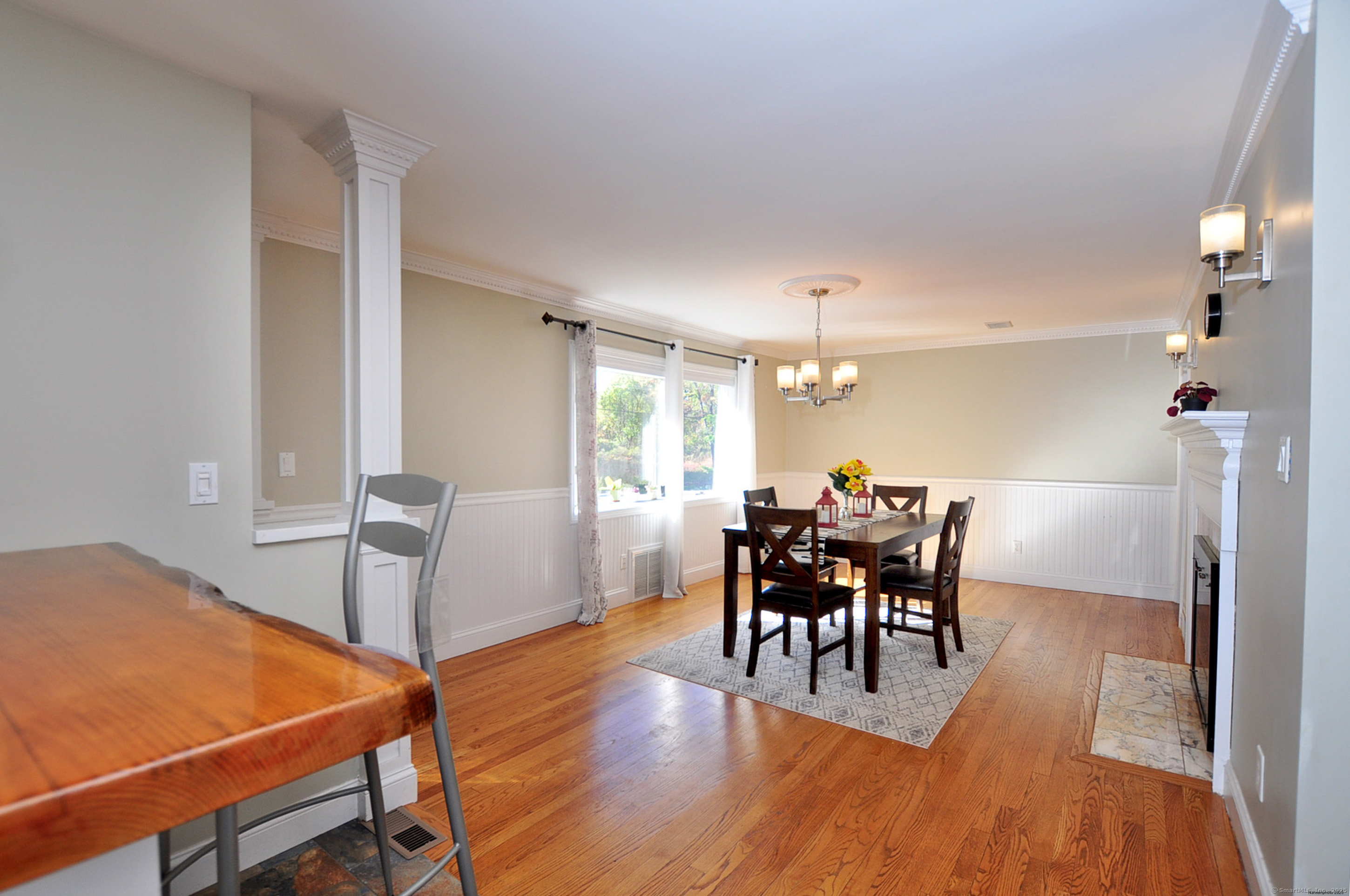 274 Smith Street South Windsor, CT 06074 - Photo 16 of 38 a dining room with furniture and wooden floor