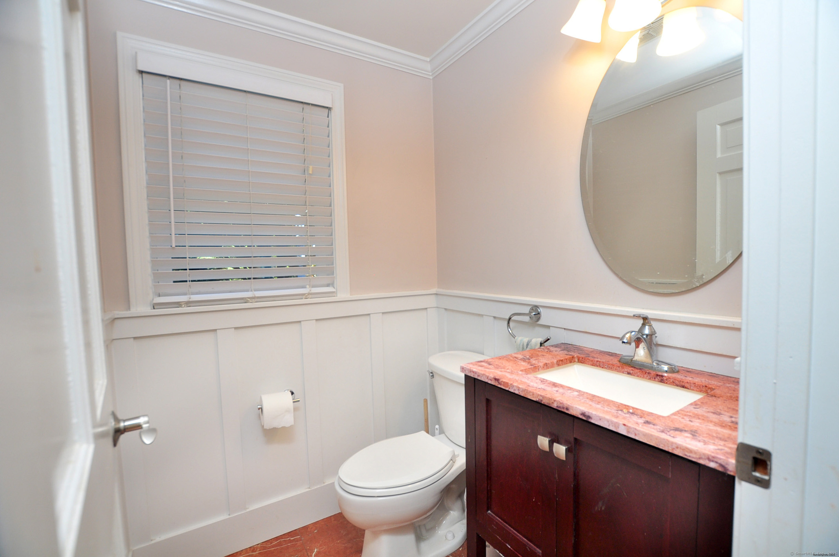 274 Smith Street South Windsor, CT 06074 - Photo 19 of 38 a bathroom with a sink and a mirror