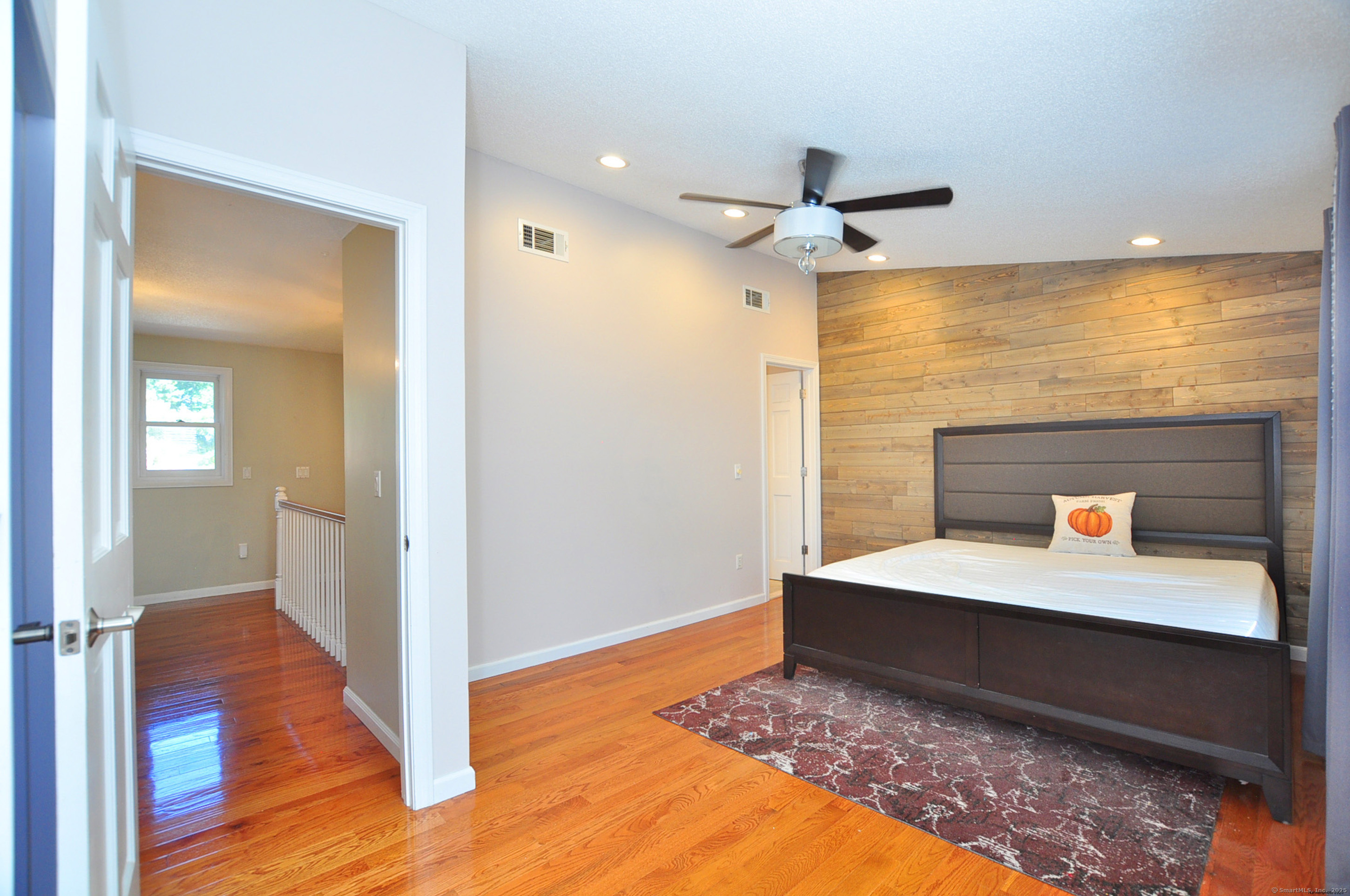 274 Smith Street South Windsor, CT 06074 - Photo 24 of 38 a view of room with wooden floor