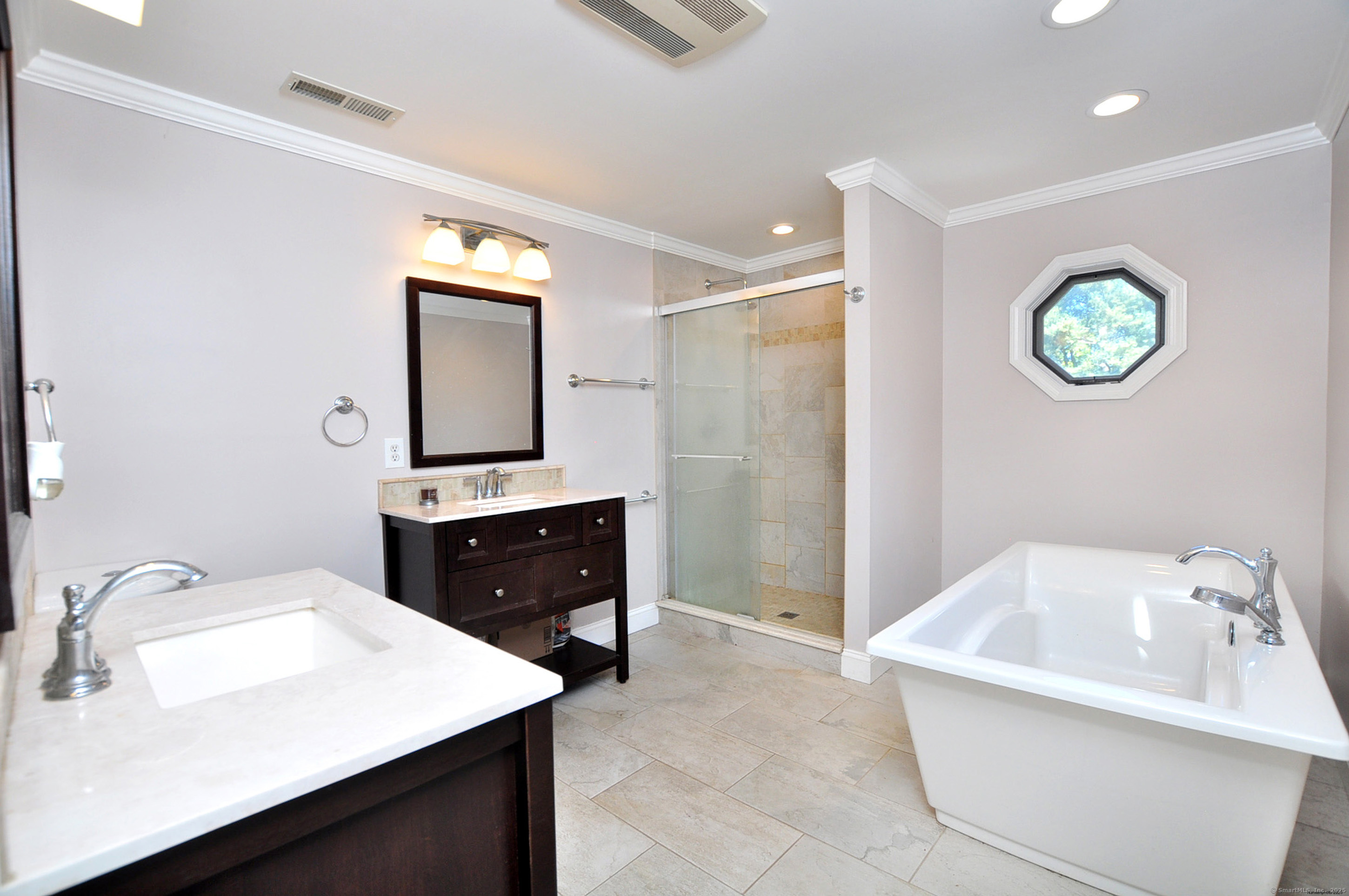 274 Smith Street South Windsor, CT 06074 - Photo 25 of 38 a bathroom with a sink vanity and a mirror