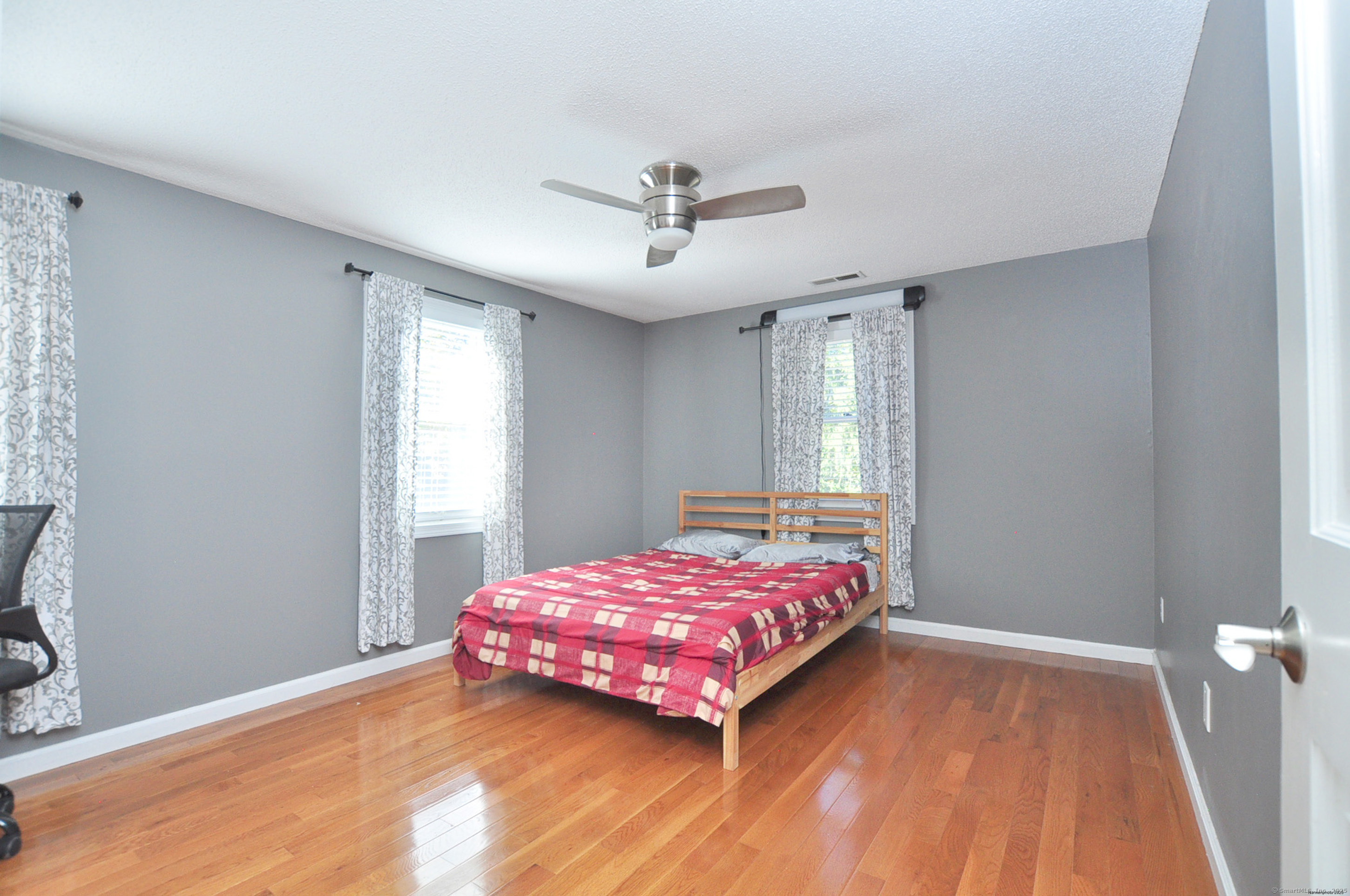 274 Smith Street South Windsor, CT 06074 - Photo 28 of 38 a bedroom with a bed and a window