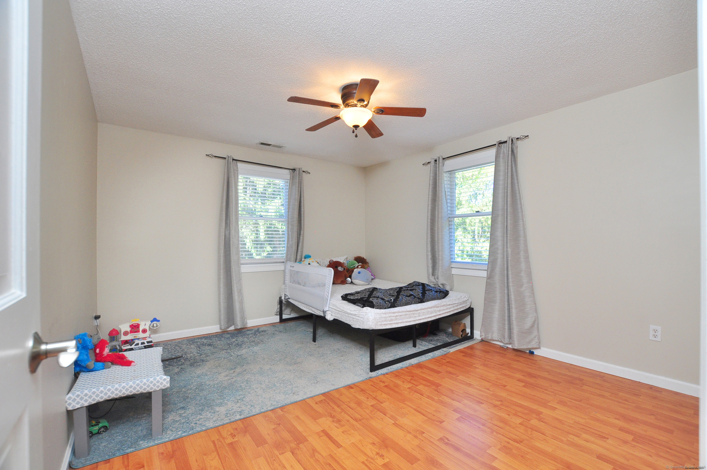274 Smith Street South Windsor, CT 06074 - Photo 29 of 38 a living room with furniture and wooden floor