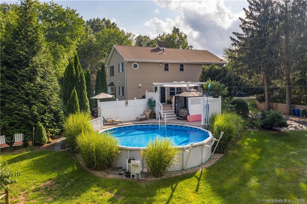 274 Smith Street South Windsor, CT 06074 - Photo 37 of 38 a view of a swimming pool with a patio