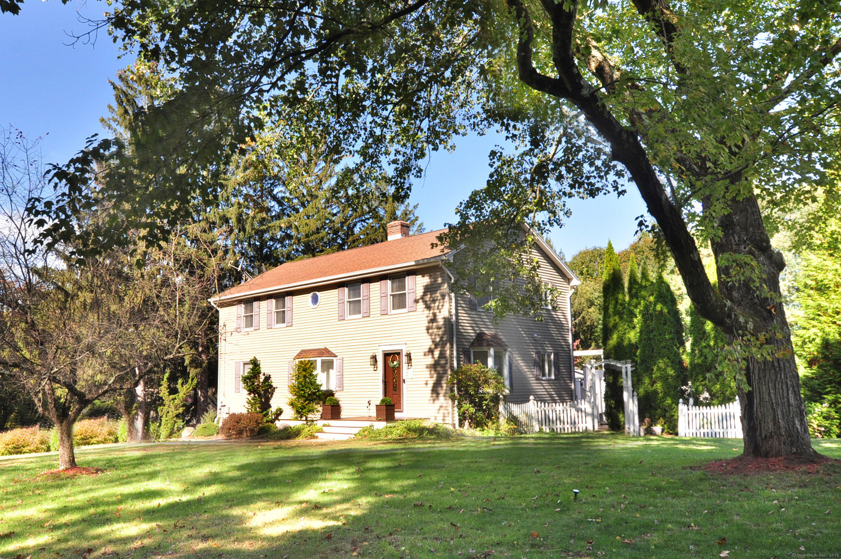 274 Smith Street South Windsor, CT 06074 - Photo 4 of 38 a view of a house with a yard