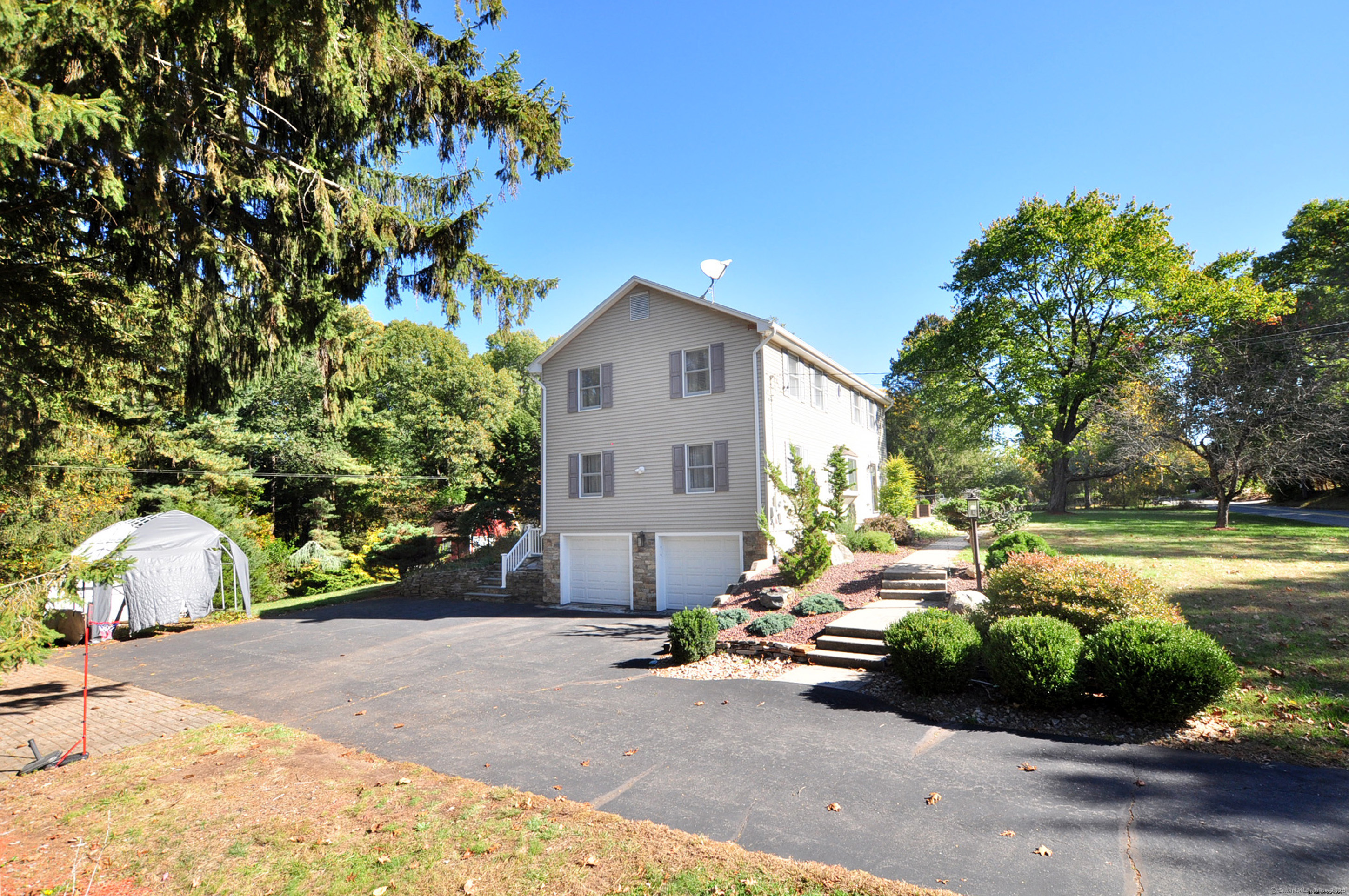 274 Smith Street South Windsor, CT 06074 - Photo 5 of 38 a view of a house with backyard and garden