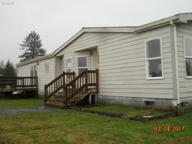 10045 South Prairie Road Tillamook, OR 97141 - Photo 1 of 24 a view of backyard with deck