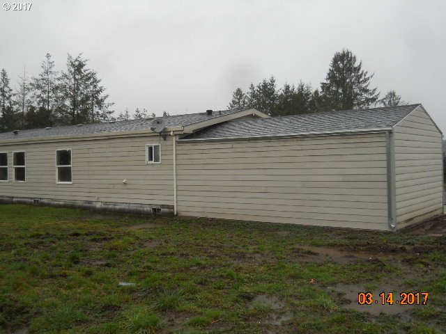 10045 South Prairie Road Tillamook, OR 97141 - Photo 7 of 24 a view of a backyard