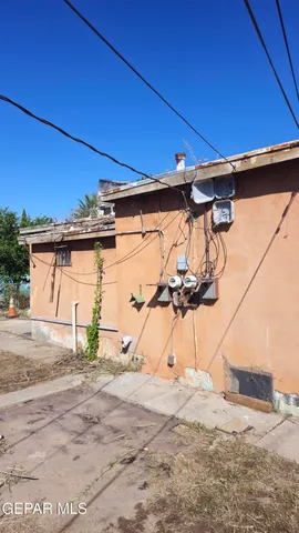 a front view of a house with a large window