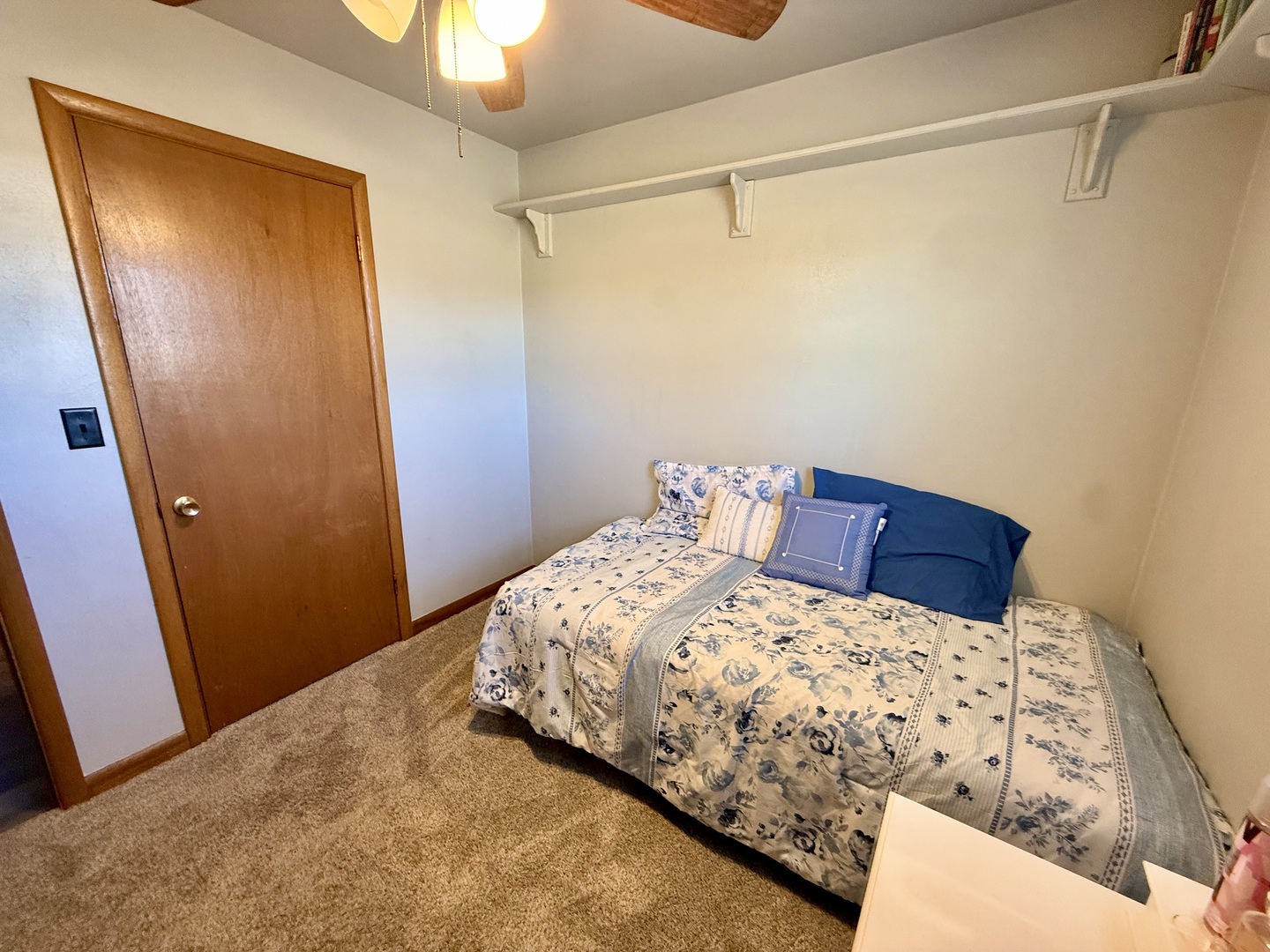 1703 24th Street Rock Island, IL 61201 - Photo 15 of 28 a bedroom with a bed and a mirror