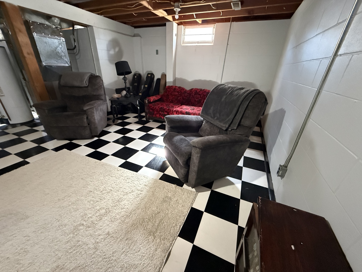 1703 24th Street Rock Island, IL 61201 - Photo 20 of 28 a bedroom with furniture and a window