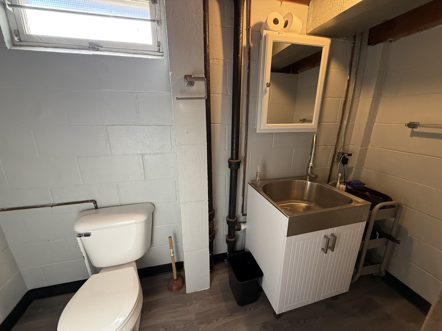 1703 24th Street Rock Island, IL 61201 - Photo 22 of 28 a bathroom with a toilet sink and mirror