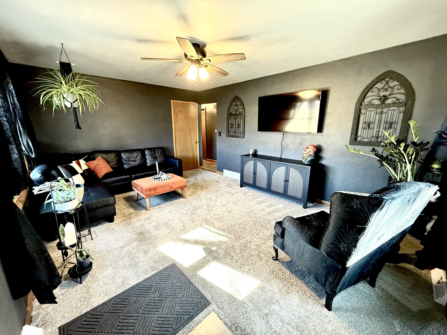 1703 24th Street Rock Island, IL 61201 - Photo 3 of 28 a living room with furniture and a flat screen tv