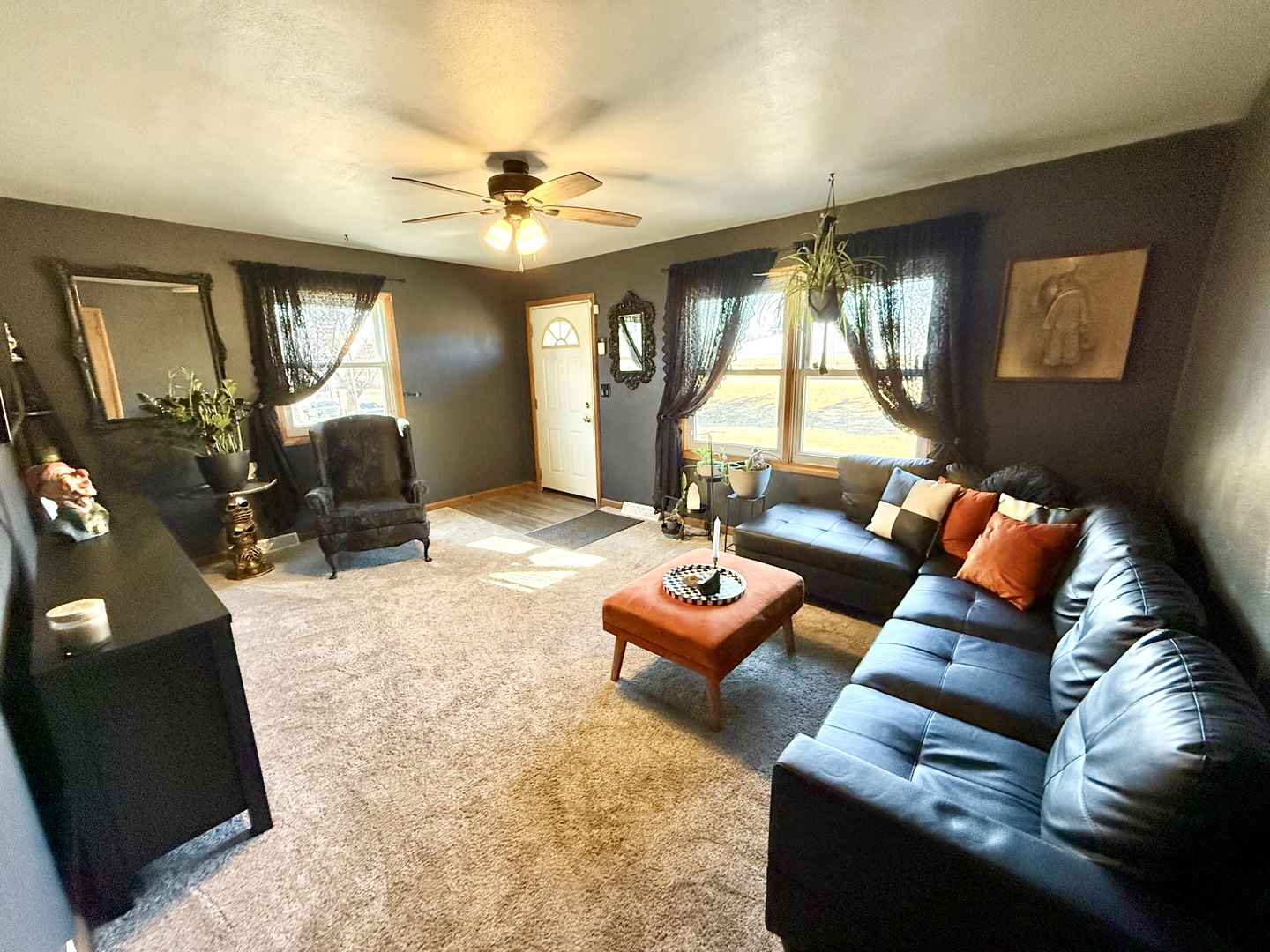 1703 24th Street Rock Island, IL 61201 - Photo 5 of 28 a living room with furniture and a large window