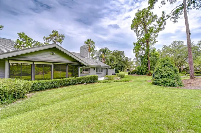 a view of livingroom with hardwood floor and ceiling fan