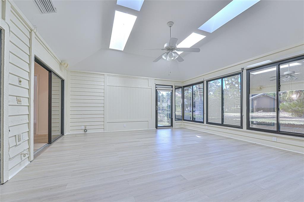5355 Cobblestone Court Wesley Chapel, FL 33543 - Photo 34 of 54 a view of an empty room with a window