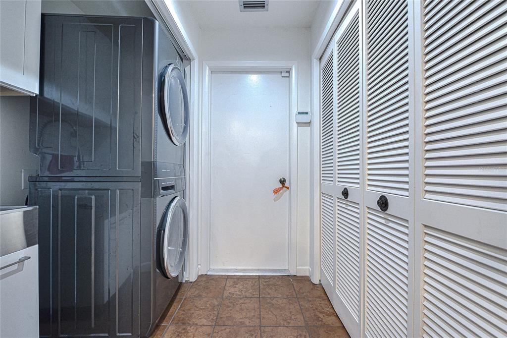 5355 Cobblestone Court Wesley Chapel, FL 33543 - Photo 36 of 54 a view of a entryway door with a mirror