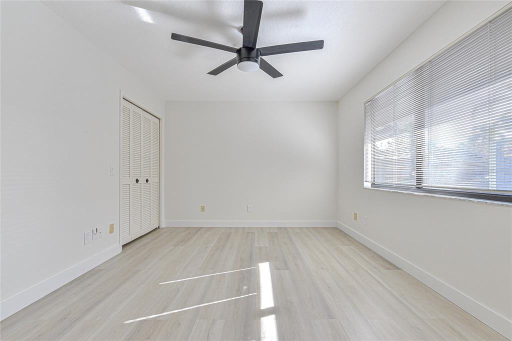 5355 Cobblestone Court Wesley Chapel, FL 33543 - Photo 37 of 54 a view of a room with rack on the wall