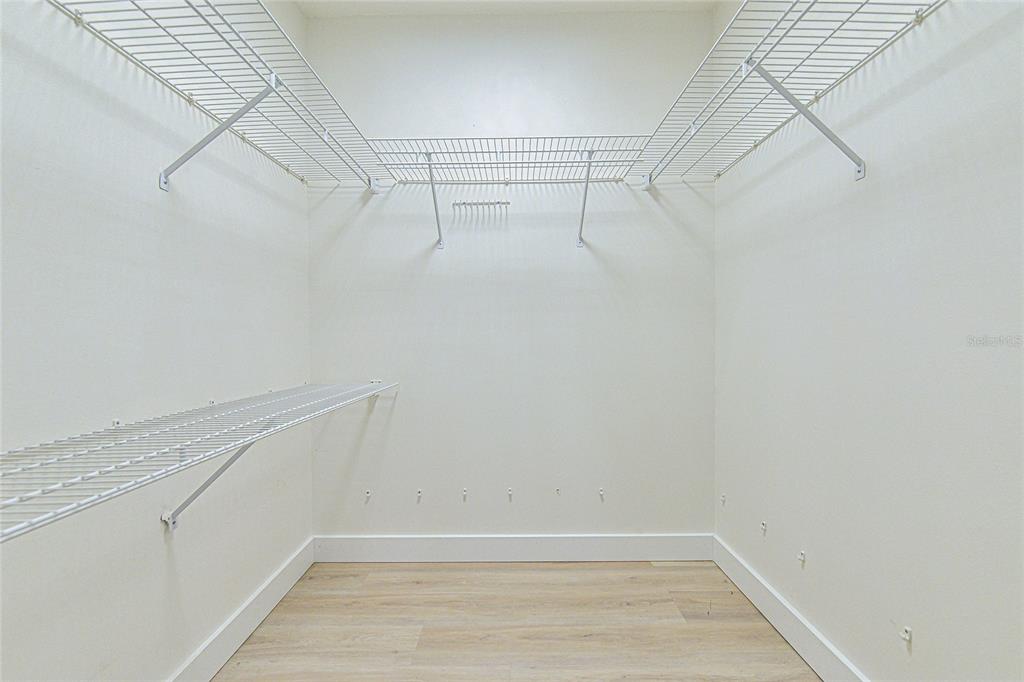 5355 Cobblestone Court Wesley Chapel, FL 33543 - Photo 44 of 54 a view of a room with racks on the wall