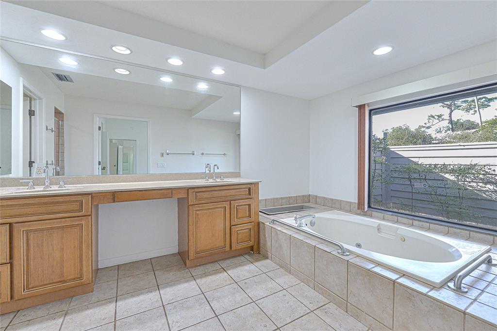 5355 Cobblestone Court Wesley Chapel, FL 33543 - Photo 51 of 54 a large kitchen with a sink and a large window