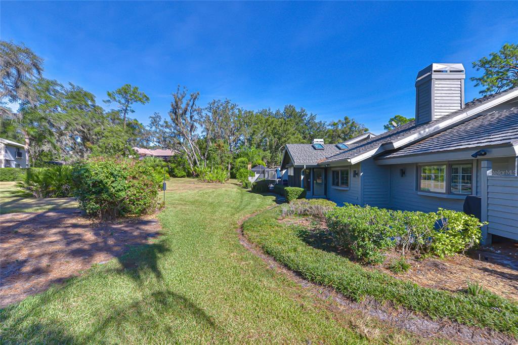 5355 Cobblestone Court Wesley Chapel, FL 33543 - Photo 9 of 54 a front view of a house with a yard