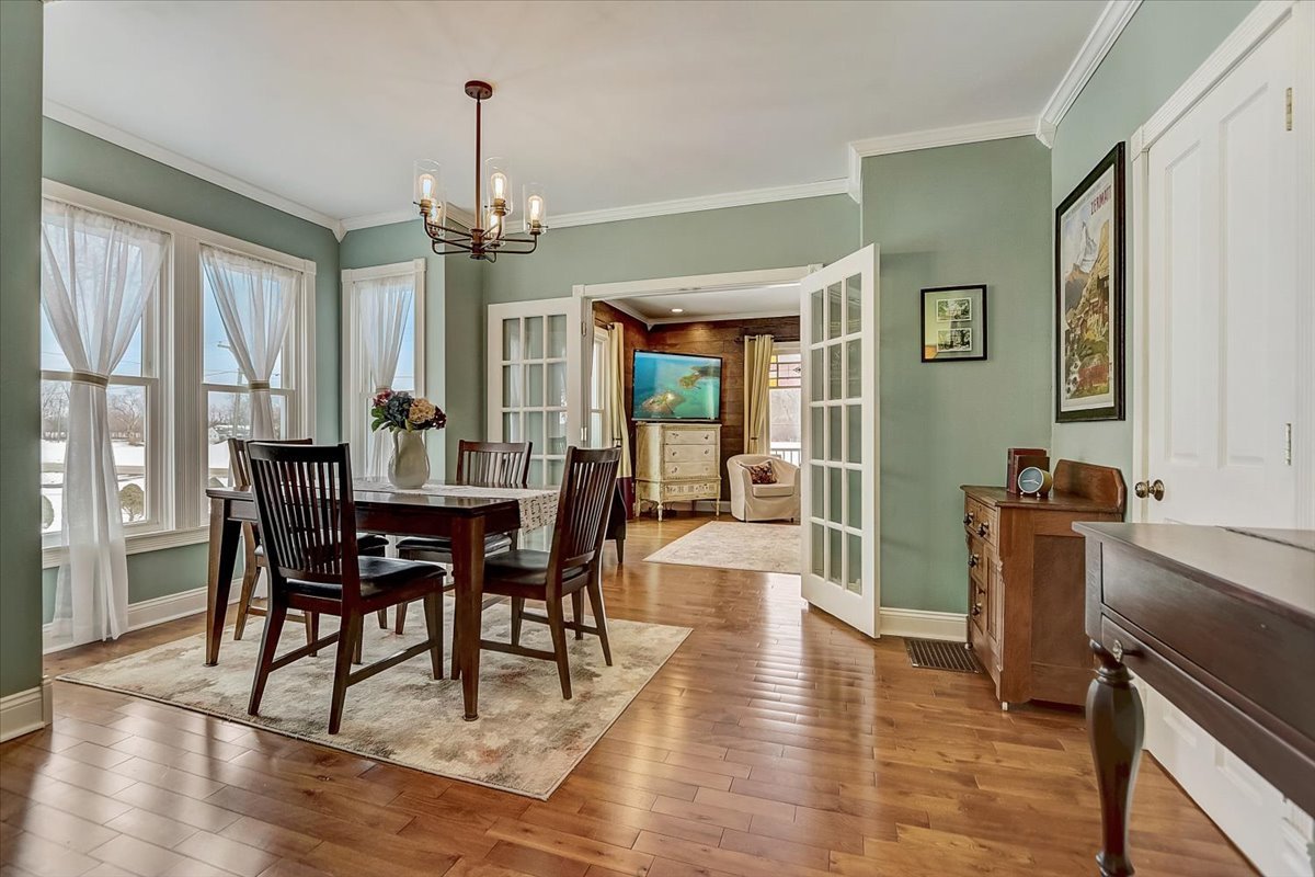 1-n154 LaFox Road Elburn, IL 60119 - Photo 6 of 44 a view of a dining room with furniture window and wooden floor