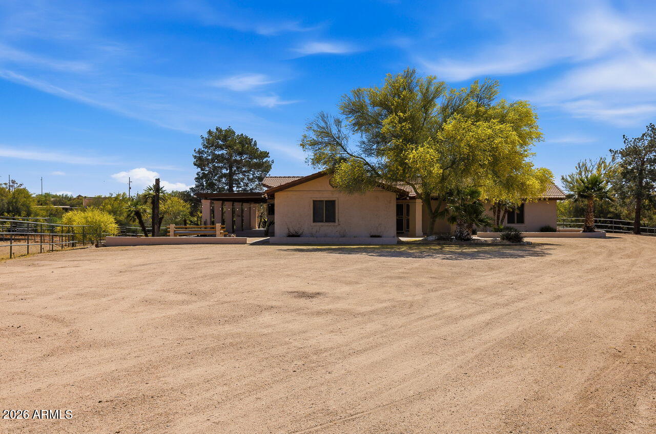1302 East Maddock Road Phoenix, AZ 85086 - Photo 3 of 40 a view of a house with a yard