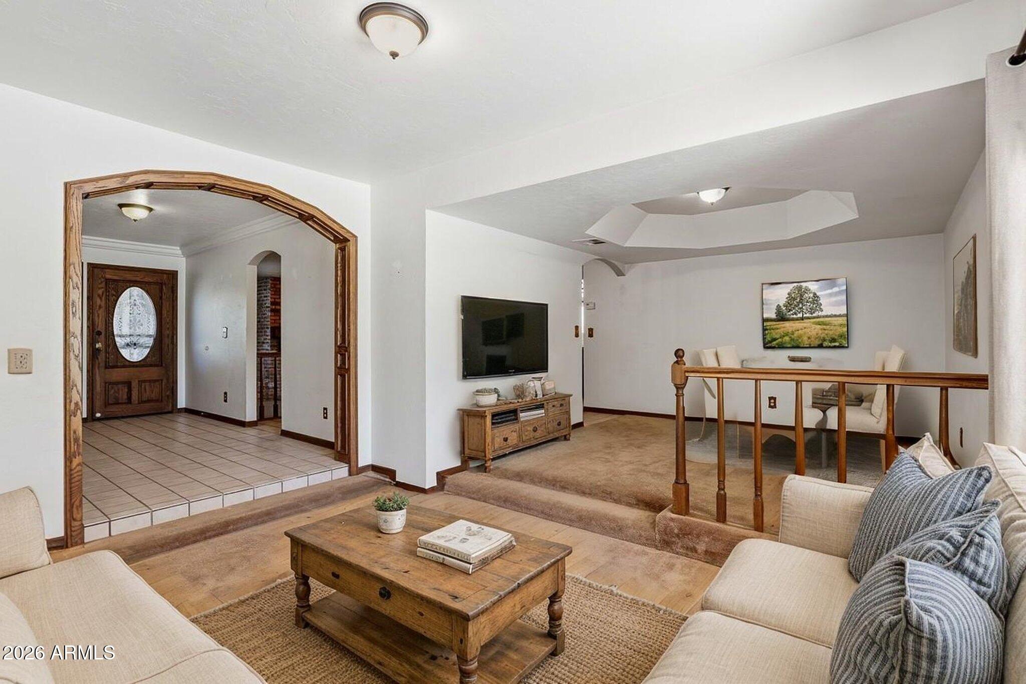 1302 East Maddock Road Phoenix, AZ 85086 - Photo 5 of 40 a living room with furniture and wooden floor
