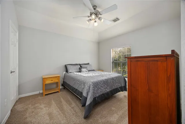 a bathroom with a sink double vanity and a mirror